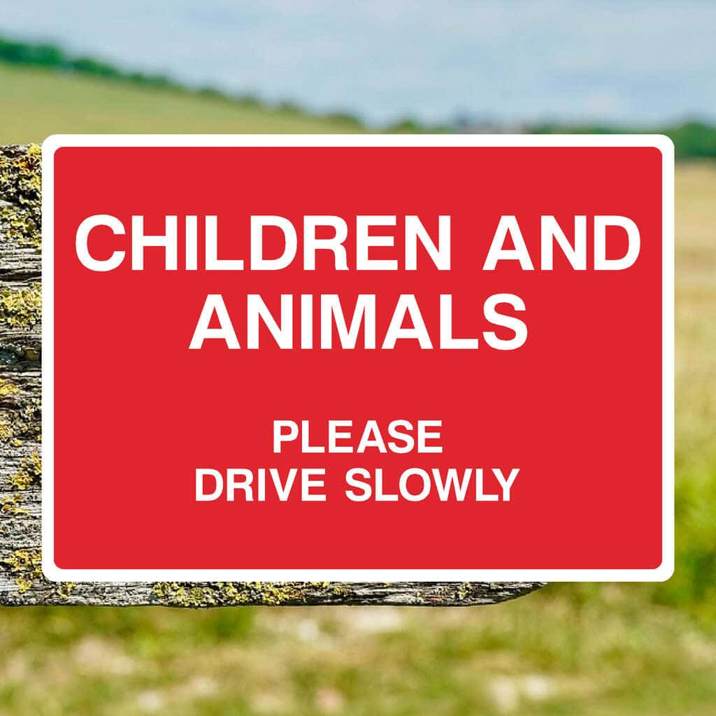 Children And Animals Please Drive Slowly Sign - The Sign Shed